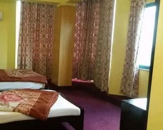 Kulsoom hotel - 伊斯蘭堡 - 臥室