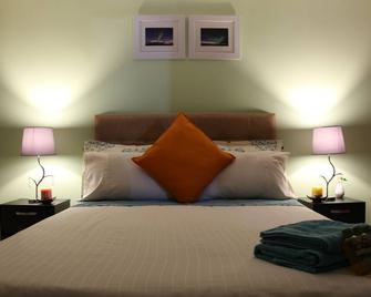 Deluxe Queen Room Apartment - كالي - غرفة نوم