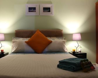 Deluxe Queen Room Apartment - كالي - غرفة نوم