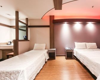 Gwangju Sangmu Hotel Utopia - Gwangju - Bedroom