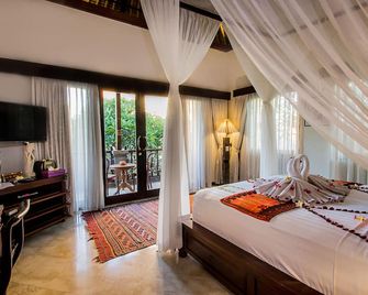 Manzelejepun Villa & Pavilion - דנפסאר - חדר שינה