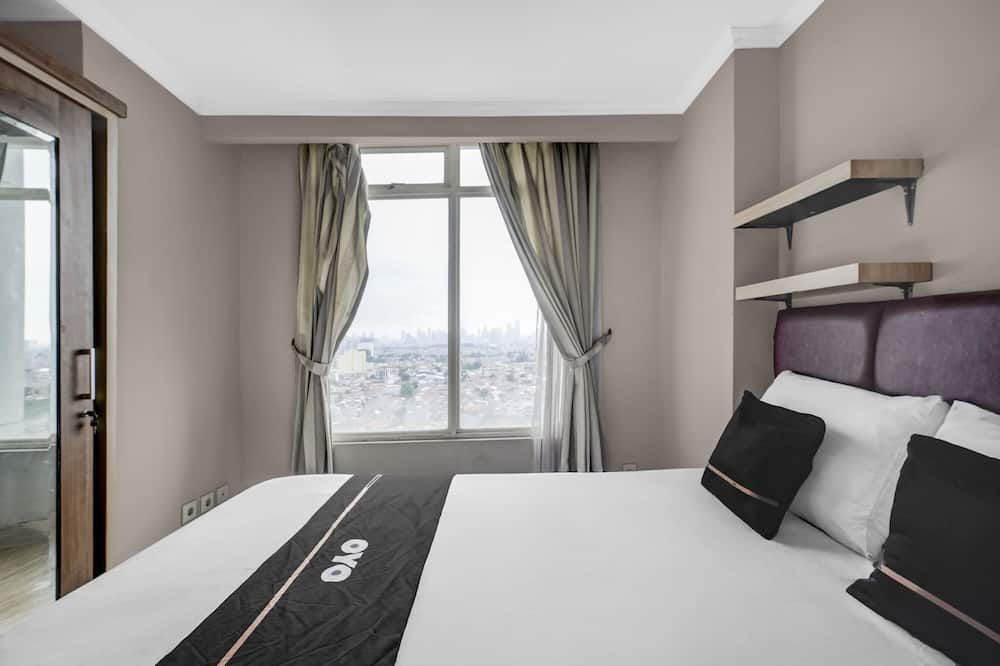 OYO 95111 Patria Park View - Yakarta - Habitación