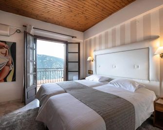 Kouros Hotel - دلفي - غرفة نوم