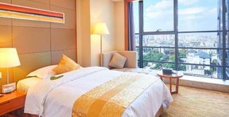 Noble Crown Hotel - Wuxi - Bedroom