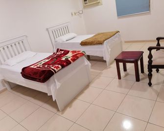 Q Economy Hotel 100 - Dammam - Slaapkamer