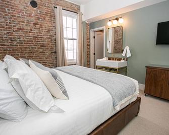 King suite at The Jacksonville Inn Features Tiled Rain Fall Shower - Jacksonville