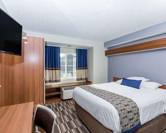Microtel Inn & Suites by Wyndham Sioux Falls - Sioux Falls - Bedroom