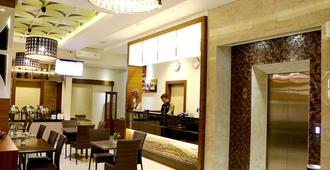 Biz Boulevard Hotel - Manado - Ravintola