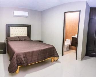 Hotel El Milagro - El Fuerte - Schlafzimmer
