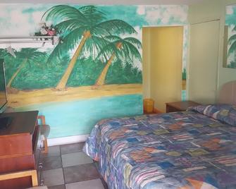 Guest Host Motel - St. Louis - Bedroom