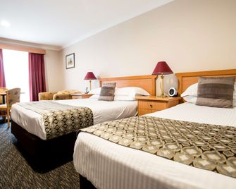 بست ويسترن بلس أول سيتلرز موتور إن - تامورث - غرفة نوم