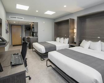 Hotel & Suites Le Dauphin Quebec - קוויבק סיטי - חדר שינה
