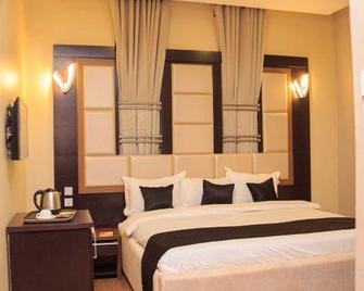 Morzi Hotel & Suites - Benin City - Habitación