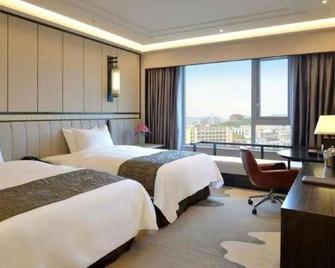 Shiji Haoting Hotel - Changde - Schlafzimmer