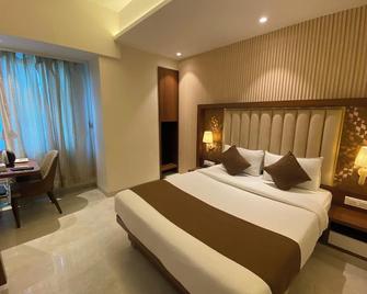 Fabhotel Czar Inn - Navi Mumbai - Спальня