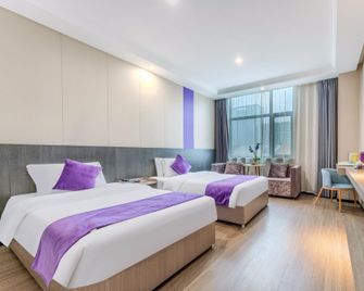 Zsmart Smart Hotel (Yan'an 100-Meter Avenue Branch) - Yan’an - Slaapkamer