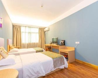7 Days Premium Hotel (Wudangshan) - Shiyan - Slaapkamer