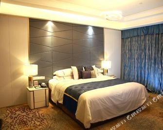 Fuxin Hotel - Qingdao - Bedroom