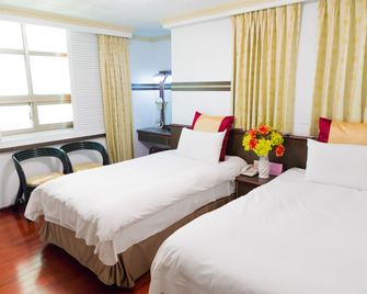 Sheng-Kuo Hotel - Magong - Schlafzimmer