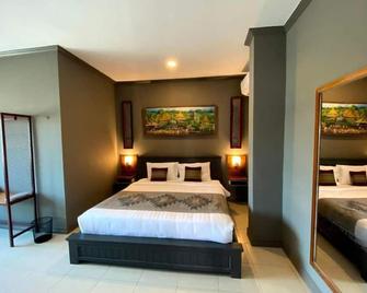 Patuxay Place - Vientiane - Schlafzimmer