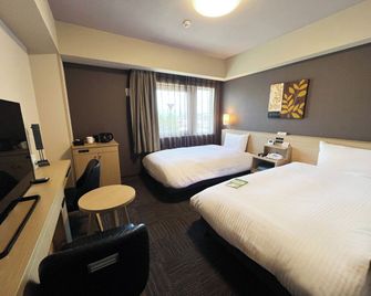 Hotel Route-Inn Higashiomi Yokaichi Ekimae - Higashiomi - Schlafzimmer