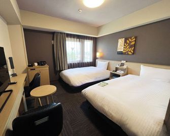 Hotel Route-Inn Higashiomi Yokaichi Ekimae - Higashiomi - Schlafzimmer