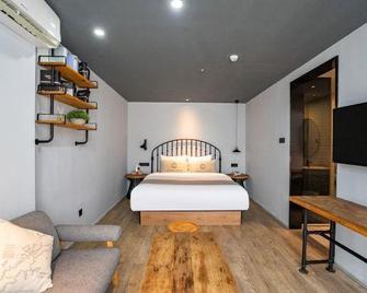 Meirui Hotel (Beiliu Central Plaza Bus Terminal) - Yulin - Bedroom