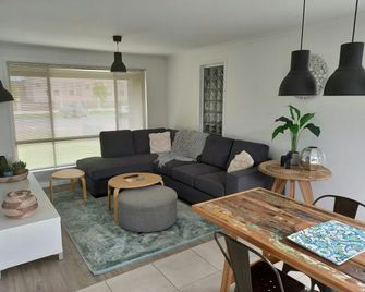 At Home Apartments - Sale - Living room