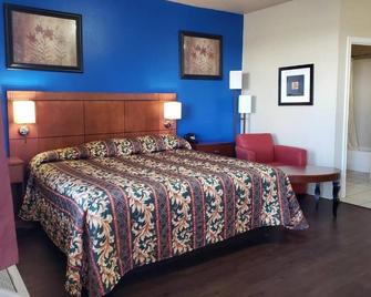 Crossroads Inn & Suites - Victoria - Yatak Odası