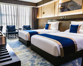 Shiji Lijing Hotel - Qujing - Bedroom