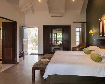 Perry's Bridge Hollow Boutique Hotel - Hazyview - Schlafzimmer