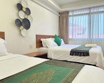 Longzhu Guesthouse - Bangkok - Slaapkamer