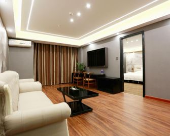 Xinyi Fashion Hotel (Checheng Branch) - Shangqiu - Slaapkamer