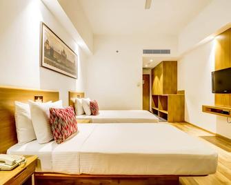 Lemon Tree Hotel, Electronics City - Bengaluru - Bangalore - Kamar Tidur