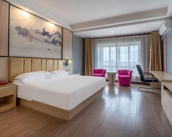 Wodun Fashion Hotel - Liuzhou - Ložnice
