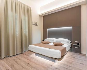 مينيينا سويتس فوريستيريا لومباردا - ميلان - غرفة نوم