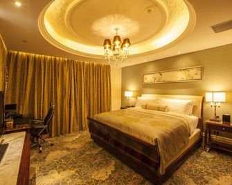 Zhongmao Haiyue Hotel - שה-ג'יאג'וואנג - חדר שינה