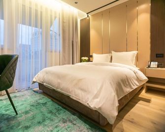 Emery Hotel Pristina - פריסטינה - חדר שינה