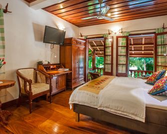 Mekong Riverview Hotel - לואנג פראבאנג - חדר שינה