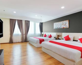 كوليكشن أو هوتل سوبر كوبوي - مالاكا - غرفة نوم