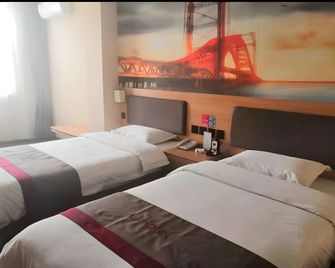 Junyi Hotel Shandong Zaozhuang Shanting District Xinyuan Road - Zaozhuang - Schlafzimmer