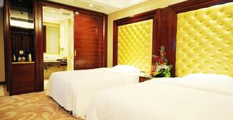 St-Tropez Hotel - Changsha - Schlafzimmer