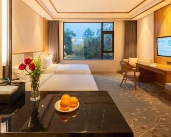 Nanjing Ziqinghu Hotspring Hotel - Nankín - Habitación