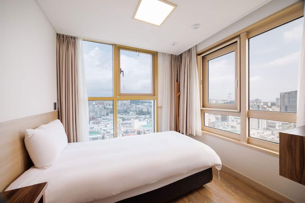 كيني ستاي جيجو سيوجويبو-هوتل كيني - سيوغويبو - غرفة نوم