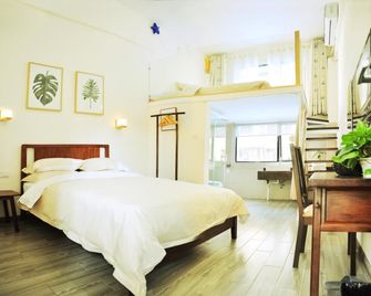 Qingcheng Inn - Guilin - Soverom