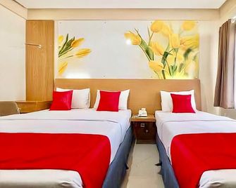 Delaga Biru Convention Hotel - Puncak - Camera da letto