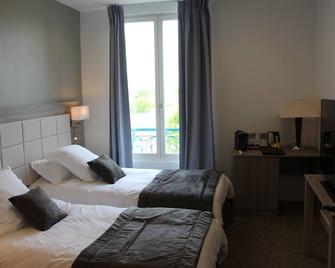 Hotel Restaurant L'Esturgeon - Poissy - Camera da letto