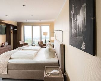 Design-Konferenzhotel & Restaurant Steinernes Schweinchen - Kassel - Kamar Tidur