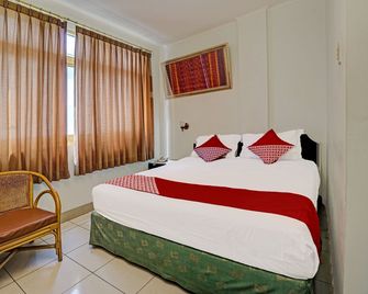 Hotel O Wisma Bari - Palembang - Bedroom