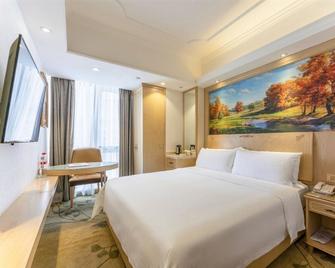 Vienna Hotel Chongqing Yangjiaping Pedestrian Street Light Railway Station - Chongqing - Habitación